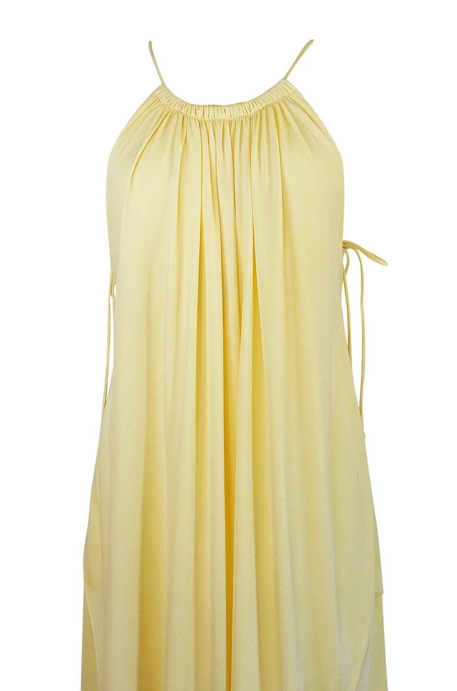 1970s Unlabeled Light Yellow Jersey Layered & Tiered Halter Dress