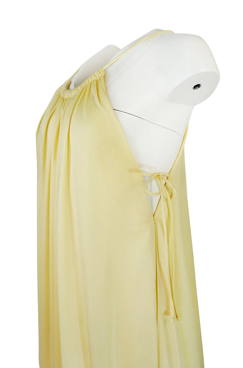 1970s Unlabeled Light Yellow Jersey Layered & Tiered Halter Dress