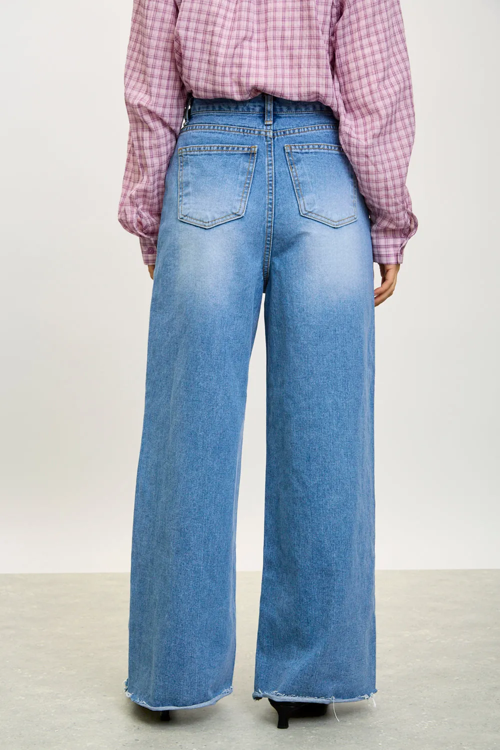 Light blue wide leg raw hem jeans