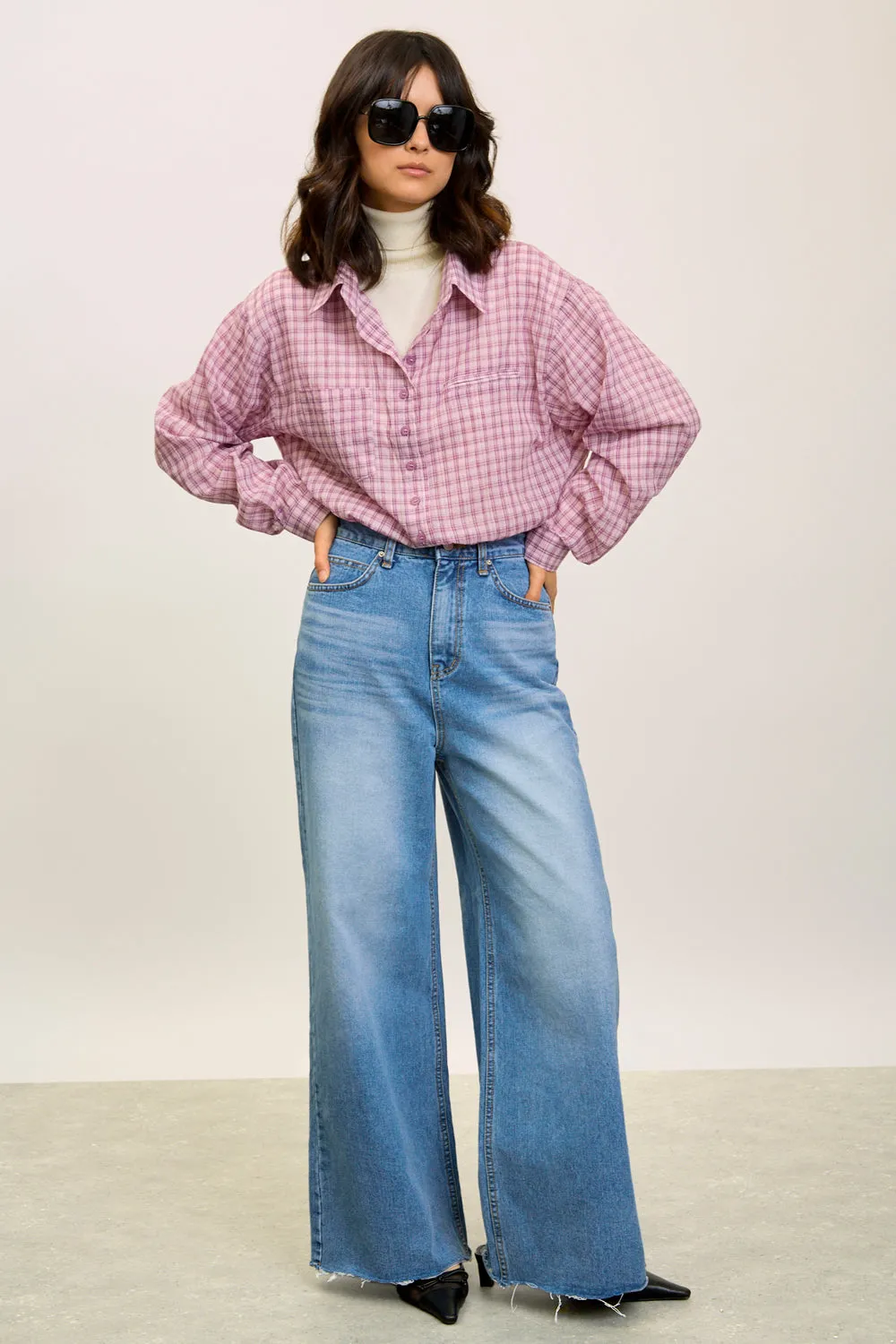 Light blue wide leg raw hem jeans
