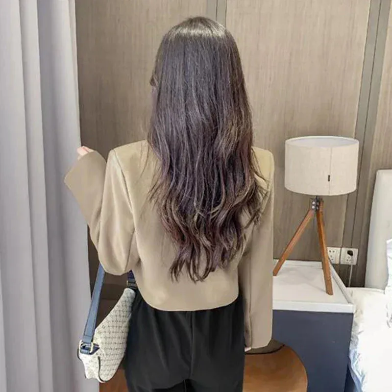 Women's short blazer with button placket and long sleeves - Stylish design for modern women