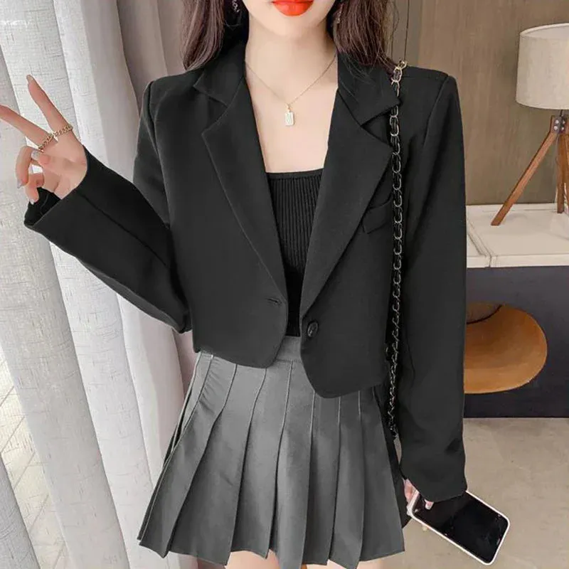 Women's short blazer with button placket and long sleeves - Stylish design for modern women