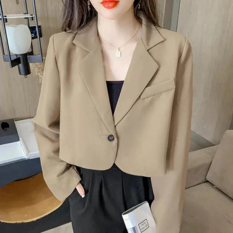 Women's short blazer with button placket and long sleeves - Stylish design for modern women